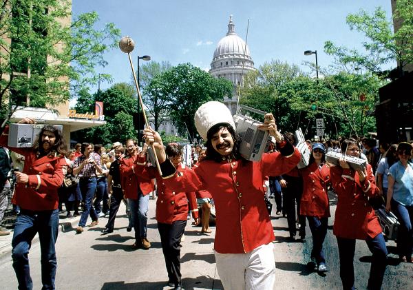 Leon Varjian leads a boom box parade