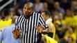 NCAA referee Ted Valentine reacts during the game between