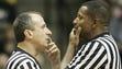 Referees Ted Valentine and Ray Perone chat about a