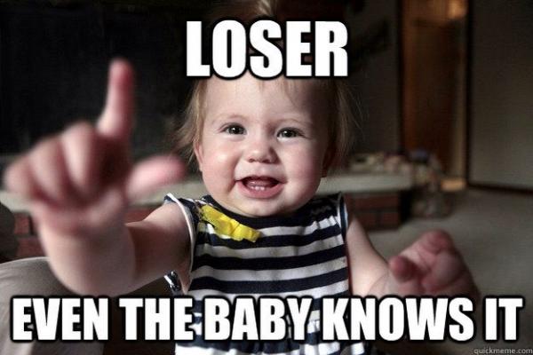 This may contain: a baby pointing at the camera with text that reads loser even the baby knows it