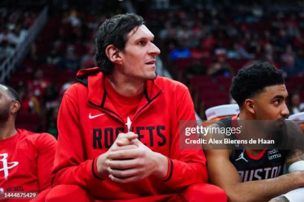 Boban Marjanovic of the Houston Rockets looks on from the bench... News  Photo - Getty Images