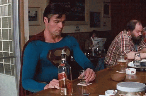 Superman Drinking - Superman GIF - Superman Supermanday Drinking - Discover  & Share GIFs