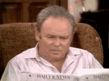 Reading Newspaper All In The Family GIF - ReadingNewspaper AllInTheFamily ArchieBunker GIFs