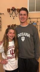 Lexi Watkins (left) with her brother, Dillon, after she verbally committed to play soccer for IU.